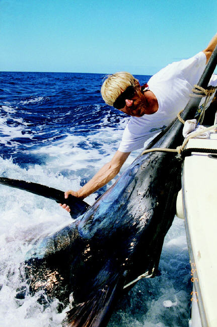 Capt. Per Magnus Ostrand with Jacky Delbrel's 80-lb. line class world record blue marlin - 1,189 lbs - Azores